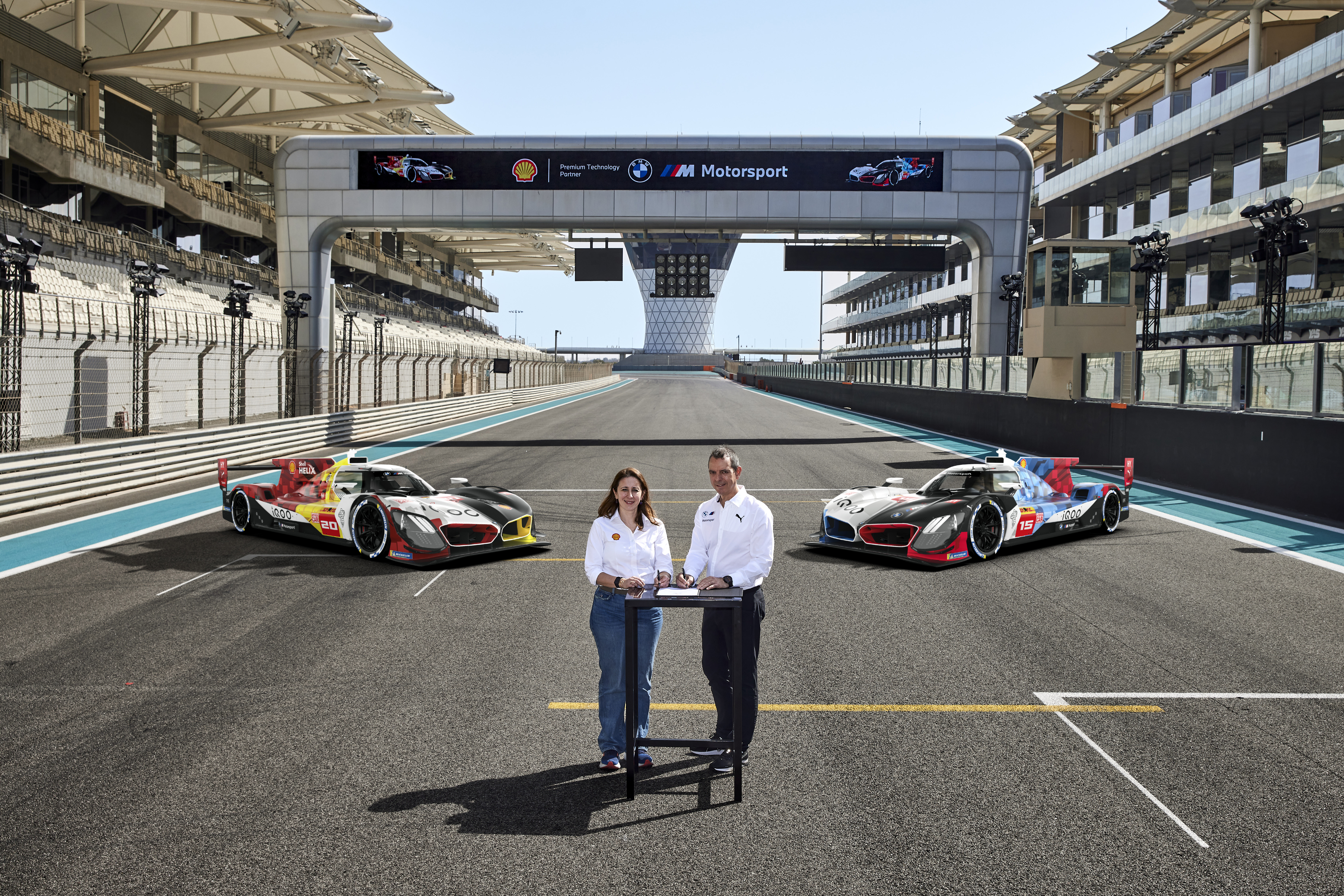 Abu Dhabi (UAE), 5 March 2025. BMW M Motorsport, Shell, partnership, contract, signature, Yas Marina Circuit, Franciscus van Meel, CEO of BMW M GmbH, Aysun Akik, Vice President of New Business Development and Global Key Accounts, Shell Lubricants